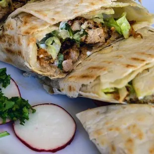 three burritos on a plate