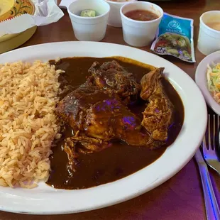 Chicken Mole, complete with fresh and tasty corn tortillas, rice and side salad