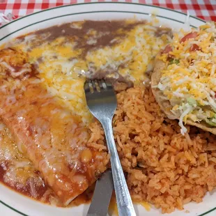 Two item lunch special. One red cheese enchilada and a shredded beef hard-shell taco.