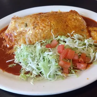 Chile Colorado wet burrito. Perfect on this cold day. Salad was cool fresh and crunchy, like always:)