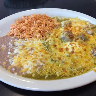Heuvos Chile Verde. Meat was delicious, but could've used a little more:( And, if you like cheese, come here.