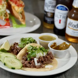 Mexican food Street tacos  Hard shell tacos  Albóndiga soup  Cool beer  Really good