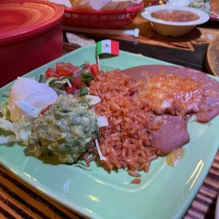 Rice, refried beans, guacamole, that comes with Fiesta fajitas