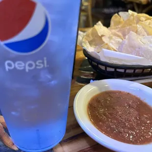 Chips and salsa and Pepsi cup.