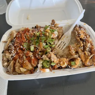 a take out container of food