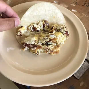 Bacon and egg on Corn tortilla taco.