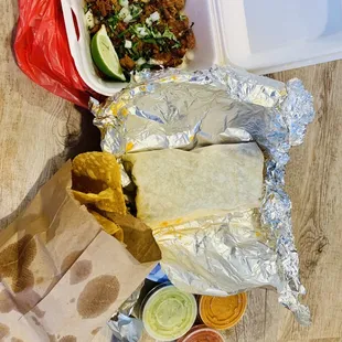 Super ground beef burrito w/extra cheese, jalapeños &amp; no rice/beans, Al Pastor taco &amp; fresh chips &amp; salsa.