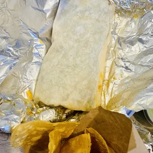 Super ground beef burrito w/extra cheese, jalapeños &amp; no rice/beans w fresh chips.