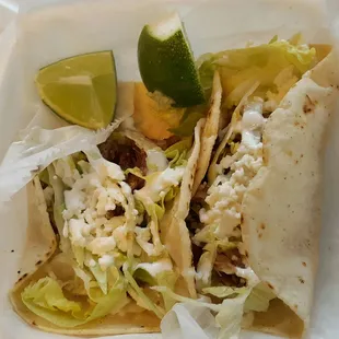 Soft shell pork tacos.