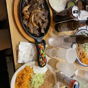 Chicken &amp; Steak fajitas with fajita side plate (rice, beans, avocado)