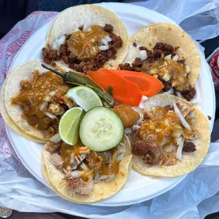 Tacos: carnitas, pastor, chicharrones