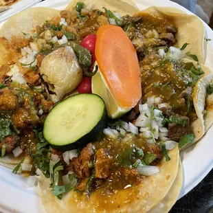 Carne asada, chicharrone, pollo adobado tacos