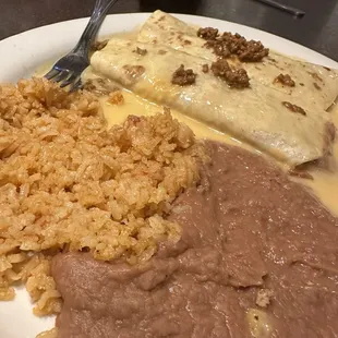 Pea Protein Burritos with Vegan Cheese, refried beans and rice.