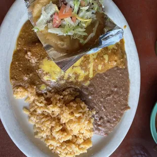 #2 Regular Plate 2 enchiladas rice beans and puffy taco