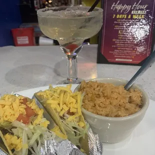 Our friend had this.   Two crispy beef tacos and side of rice.