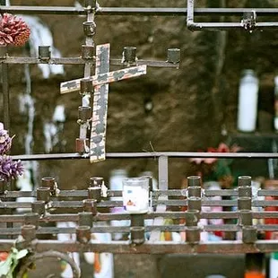 An altar of candles at the shrine.