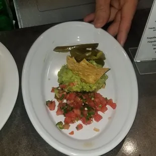 Guacamole, pico de gallo and jalapenos for the botana platter.
