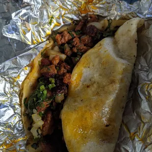 a burrito wrapped in foil