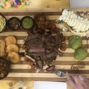 Mega Parillon! Steak, Chicken, Chorizo, Yuca, Arepas, Chicharrones, Avocado, Slaw, Guasacaca, Salsa &amp; a Cachapa!