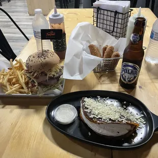 a sandwich and fries on a table
