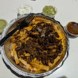 Carne asada fries to-go (nacho cheese...)