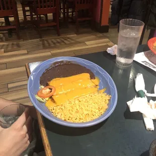 Son's vegetarian was excellent . Black beans flavorful as was rest of plate