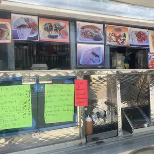 a food truck with menus