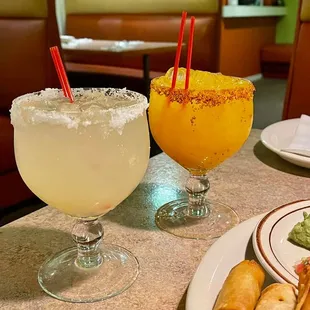 a plate of food and a drink on a table