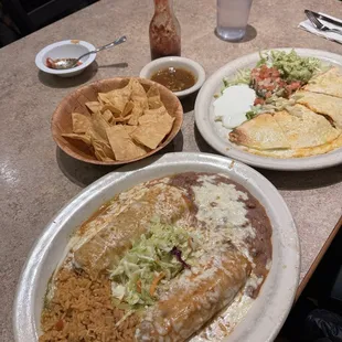 Pork enchilada and pork tamale entree with chicken Quesadilla Mexicana appetizer.