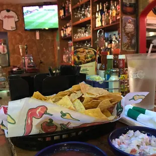 mexican food and drinks at a bar