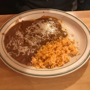 My sons enchilada plate.