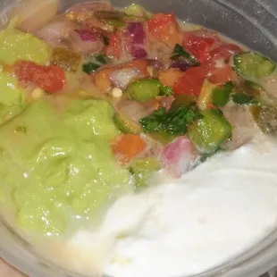 Guac, s. cream, + pico de gallo came w/ lunch takeout. little watery, but great flavor from the pico - perfect amount of cilantro + peppers