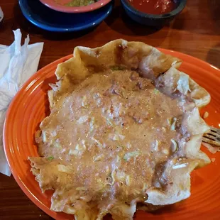 Wow.  Ordered a taco salad and it came out like soup. How is this place in business?