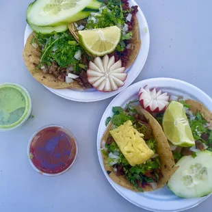two plates of mexican food