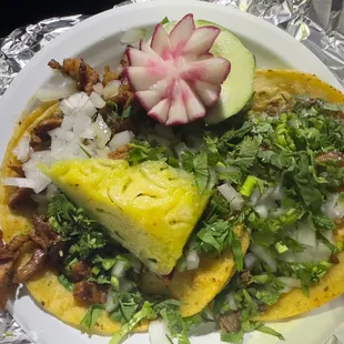 Al pastor and suadero tacos