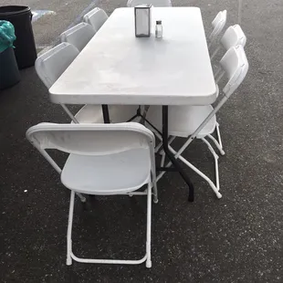 Seating available.  It&apos;s even under a canopy of it rains.