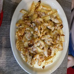 Arroz con pollo with fries instead of rice