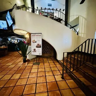 a spiral staircase in a restaurant