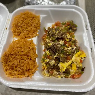 a meal in a styrofoam container