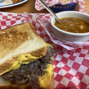 Barbacoa grilled cheese sandwich. Comes with a big red.