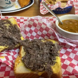 Barbacoa grilled cheese sandwich, open.