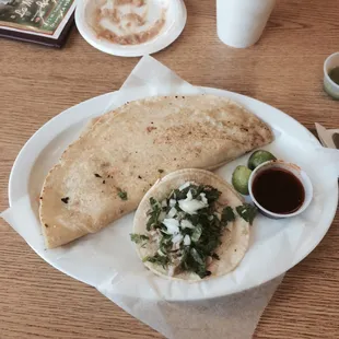 Calabaza (squash blossom) quesadilla and carnitas taco.