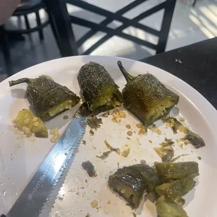 Fire roasted jalapeños on the side.