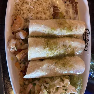 Enchiladas Del Mar with flour tortilla.