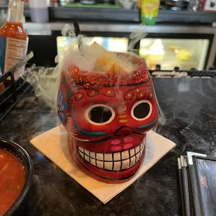 a mexican themed drink in a glass