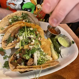 a plate of tacos