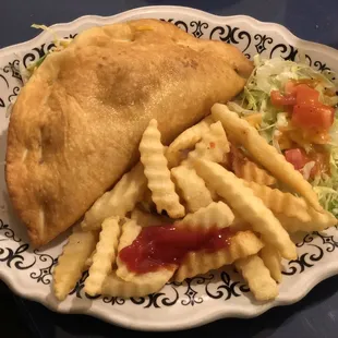 a plate of food with a sandwich and french fries