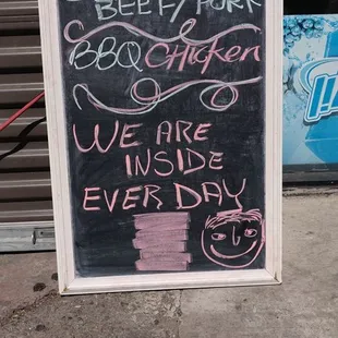 Welcome sign. New location at Alpine Market