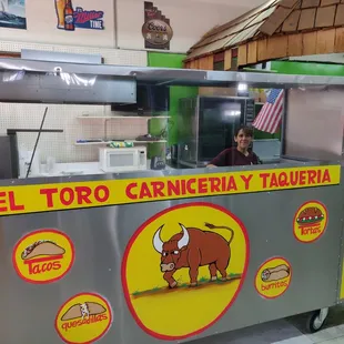 Lydia Avina, owner, at the grill