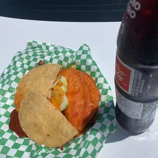 Asada mulita cut for convenience and Quesabirria taco and Mexican coke